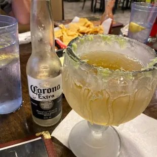 Corona with an ice cold glass, lime on the edge and salt. Super yummy