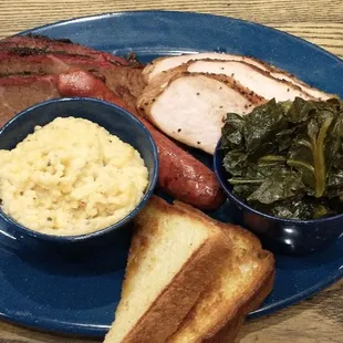 Three-meat, with garlic cheddar grits and collards