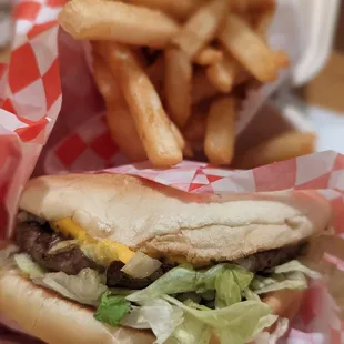 Regular cheeseburger with American cheese and a large fry. Delicious!