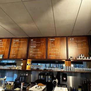 menus on the wall of the coffee shop