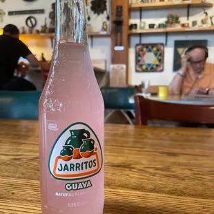 a bottle of jarritos guava