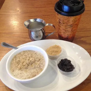 Oatmeal with two sides and milk.