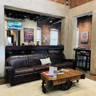 a leather couch and coffee table