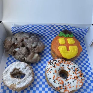 a variety of doughnuts in a box
