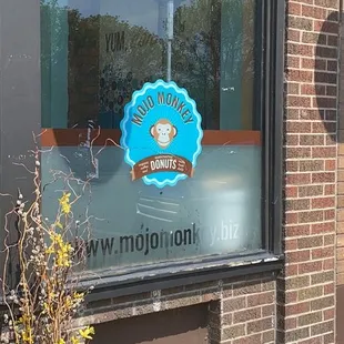 a blue planter with flowers in it