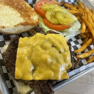 Classic burger with Cajun fries.