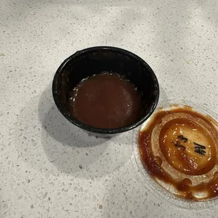 The spoon full of barbecue sauce they gave me for a sandwich and 5 ribs.