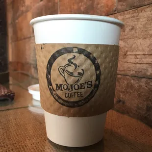 a coffee cup on a table