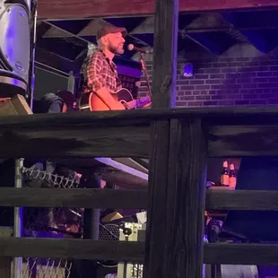 a man playing a guitar