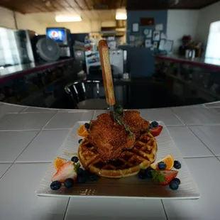 MoJo's chicken and waffle, fresh fruit and berries. Yum :-)!!!