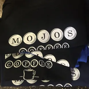 a cup of coffee on a t - shirt