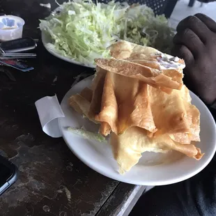 Taco salad was good.... the shell was very tasty...still not sure why he turns it over to eat but would&apos;ve liked more meat in it