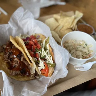 Puffy Style Brisket taco w/ slaw on the side and a fajita taco