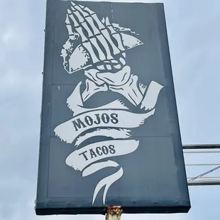 a sign for a taco shop