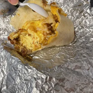 It's supposed to be a brisket and cheese and egg. But all I see is egg and cheap cheese