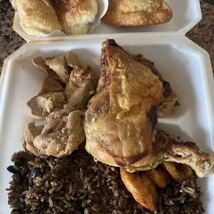 Rice and beans, Baked Chicken, Pork Chunks, beef empanada, cheese danishes or blintzes. As the picture shows everything was dry.