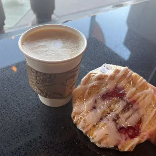 a pastry and a cup of coffee