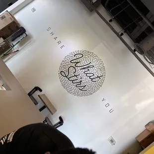 a man standing in a coffee shop