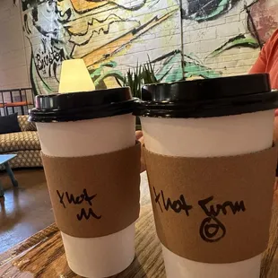 Extra hot Mocha and extra hot Turmeric Latte with oat milk