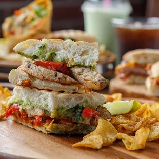 a grilled chicken sandwich and chips