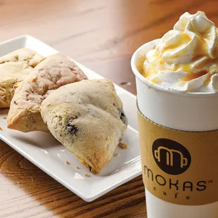 a cup of coffee and a plate of pastries