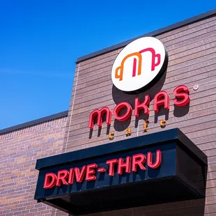 drive thru sign on brick building