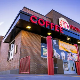 the entrance of a coffee shop