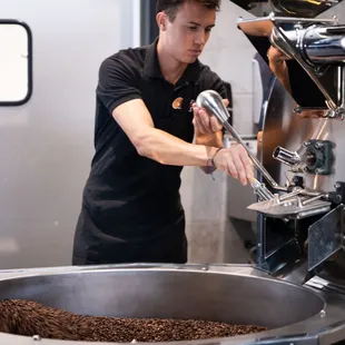 a man making coffee