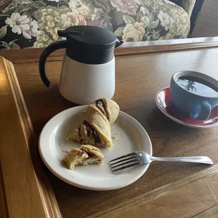 Cinnamon twist and a dark coffee