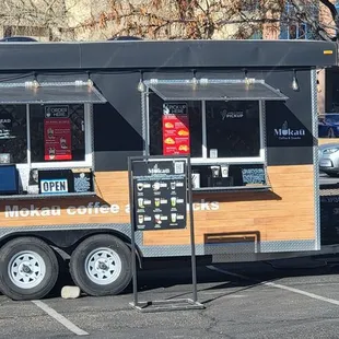 a food truck parked in a parking lot