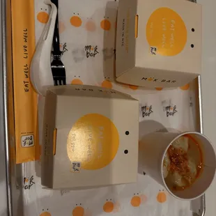 dumpling soup and snack food in cute lil boxes