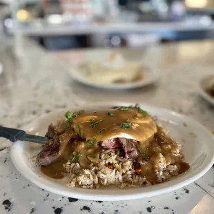 The best loco moco in Oahu. Comes with a ribeye steak, fried rice, and two eggs