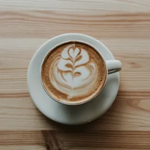 a cup of coffee on a saucer