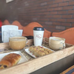 Chocolate croissant, Mufawaar, vanilla cappuccino, baklawa and Hot Chocolate