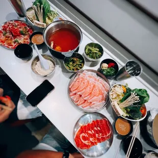 Broths: Spicy miso / +$2 &amp; Chicken / +$2. Flat iron "Mokkoji cut" / $20.98 (reg.), Pork belly / $17.98 &amp; Colorado lamb / $9 (side)