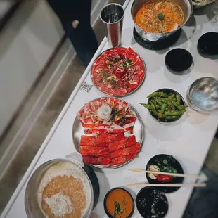 Broth: Chicken / +$2 w/ Combo: Toro &amp; Colorado lamb / $25, Broth: Spicy miso / +$2 w/ Flat iron / $20.98 + Edamame (garlic) / $5