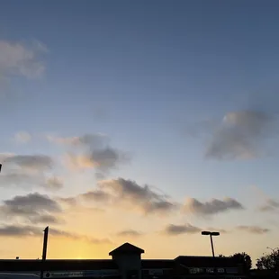 Watching the sunrise while waiting for our table