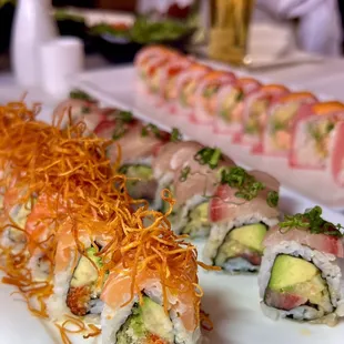 a plate of sushi rolls