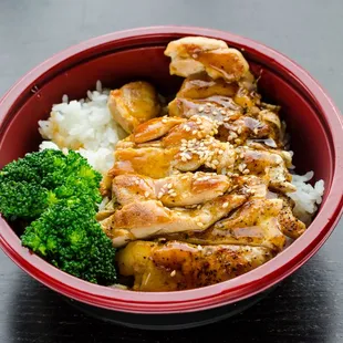 a bowl of rice, broccoli, and chicken