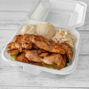 a chicken and rice meal in a styrofoam container