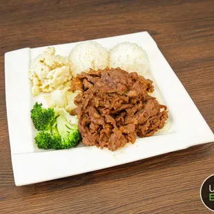 beef and broccoli on a plate