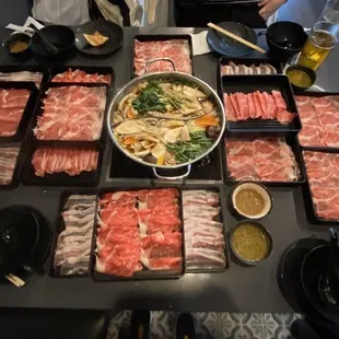 Sukiyaki broth with a lot of meats.