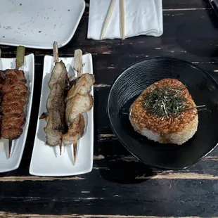 Yaki Onigiri to scale next to skewers