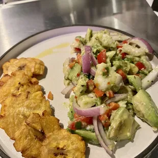The ceviche (one of their newest plates) comes with patacones. The most flavorful ceviche I've had in years!