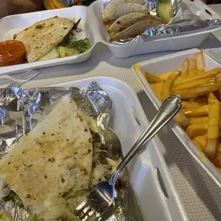 Pork tacos, beef quesadilla, cheese fries.
