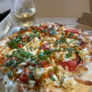 Hot Honey Chicken pizza on a gluten free crust.