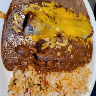 Nexican Hot Plate (one cheese enchilada, one tamale with chili con carne, rice, and beans)