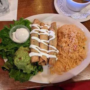 Flautas. Comes with beans as well