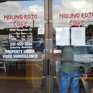 a man opening the door