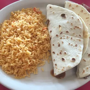 Carne Guisada, Bean &amp; Cheese w/ Bacon, and a side of rice. (: